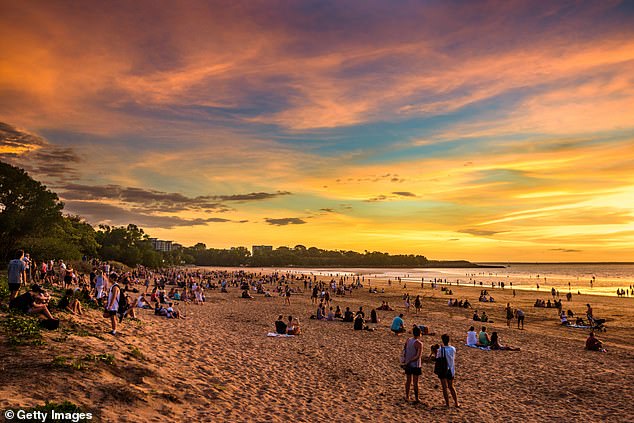 Darwin continues to have its own tropical weather system and will experience days of temperatures in the 30s this week (pictured: Mindil Beach, Darwin)