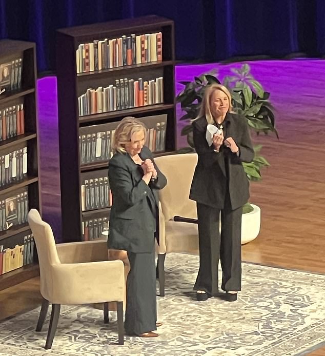 Hillary Clinton (left) and Katie Courick (right) pose at the end of the interview. Clinton expressed anger that former President Donald Trump did not try to 