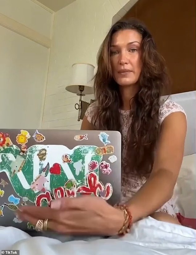 She then showed off a 'piece of art' on the front of her computer made by her sister Gigi Hadid's three-year-old daughter Khai.