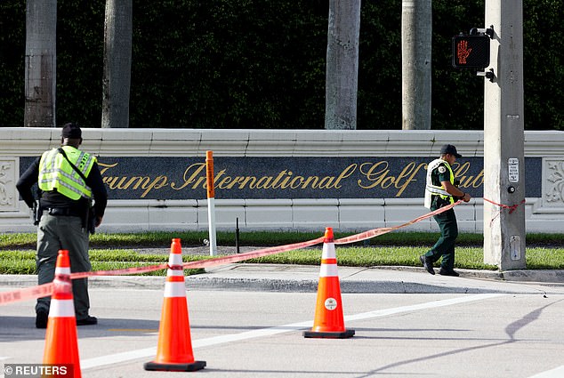 Law enforcement officers work after reports of gunfire outside the Trump International Golf Course in West Palm Beach on Sunday.