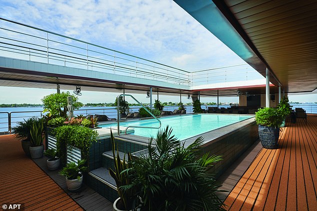 Jo says: 'Unusually for a riverboat, the impressive outdoor pool (above) is big enough to swim in – 100 lengths takes half an hour.'