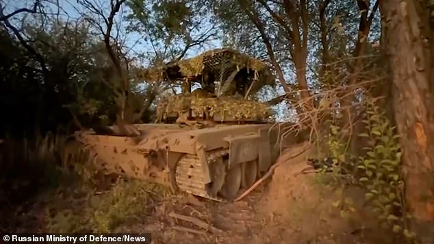 Russian tanks fire at Ukrainian military positions in the Kursk region of Russia. The Russian Defense Ministry released the footage on September 10.