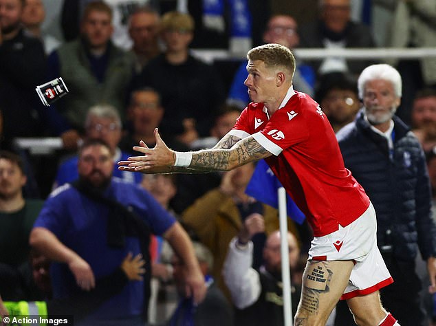 McClean caught a drink thrown at him by Birmingham fans in the stands.