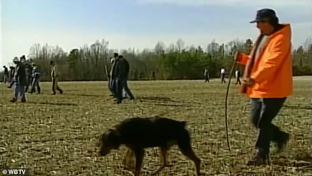 The case baffled investigators who have been looking into the case for two decades. Here locals are seen in 2000 searching for the title.