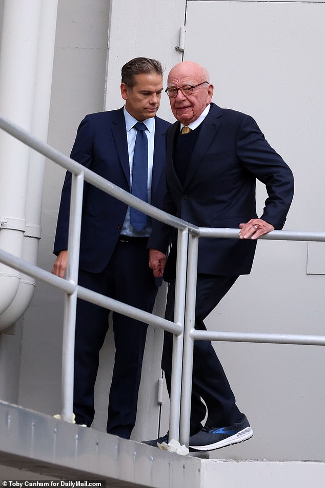 Murdoch wore comfortable sneakers to the hearing, unlike his sons' dress shoes.