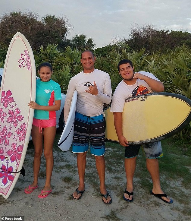 Maphurs said beach security rarely sees experienced surfers in accidents, other than a shark bite. She also said surfers are not supposed to be within 150 feet of the pier, but she wasn't sure how close Alvarado was. PICTURED: Jorge Alvarado (center), Dylan Alvarado (right) and Emily Alvarado (right)