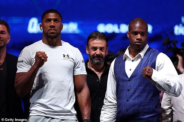 Usyk was scheduled to fly to London to watch Anthony Joshua (left) take on Daniel Dubois (right).