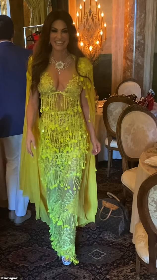 In another clip, she can be seen posing in another elaborate and embellished yellow dress and spinning around with her attached cape.