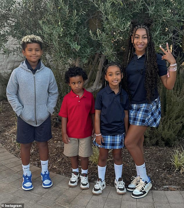 The 43-year-old businesswoman showed her children off in their uniforms before sending them off for a day of learning.