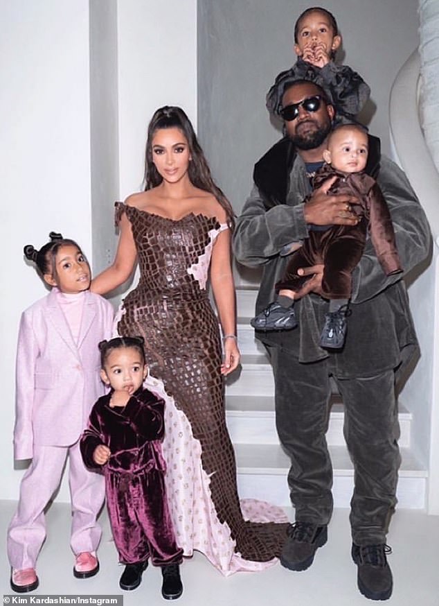 Kardashian shares her four children with ex-husband Kanye West; pictured in 2019