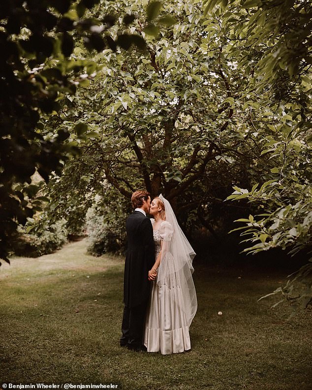 Princess Beatrice's husband Edoardo shared a never-before-seen image of them kissing at their wedding anniversary this year.