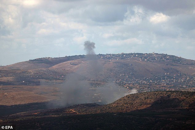 Smoke rises from an Israeli airstrike on the village of Blida in southern Lebanon, as seen from an undisclosed location in the Upper Galilee in northern Israel, September 17.