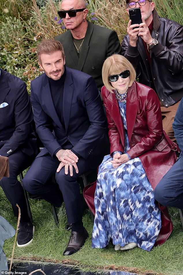 Chatting to the 74-year-old Vogue fashion icon as the pair prepared for the outdoor show in the Italian city, Anna looked effortlessly chic as she opted for a floor-length burgundy leather jacket.