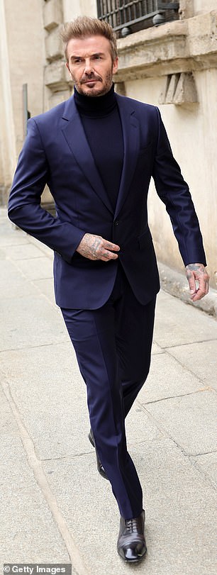 David looked effortlessly chic as he completed the navy look with shiny black brogues.