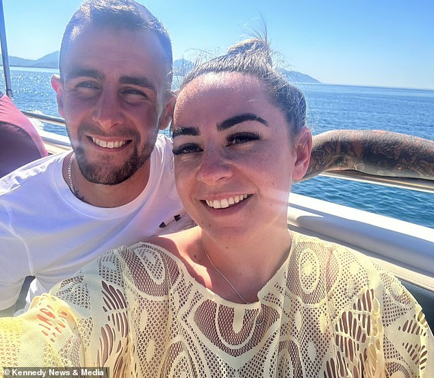 Myk and Charlotte Estlick, pictured on holiday in Turkey last year, were unable to return in May after an ink blot on their passport caused airline staff to turn the family away.