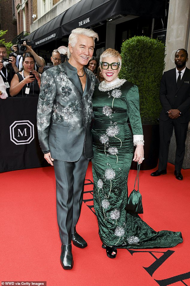 Pictured: Luhrmann and his wife of 27 years, designer Catherine Martin, at the Met Gala in May.