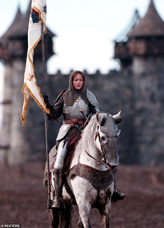 The true story of Joan of Arc centers on a peasant girl who led an army against the English in the Hundred Years' War during the Middle Ages. Pictured: Leelee Sobieski in a scene from the 1999 miniseries Joan of Arc