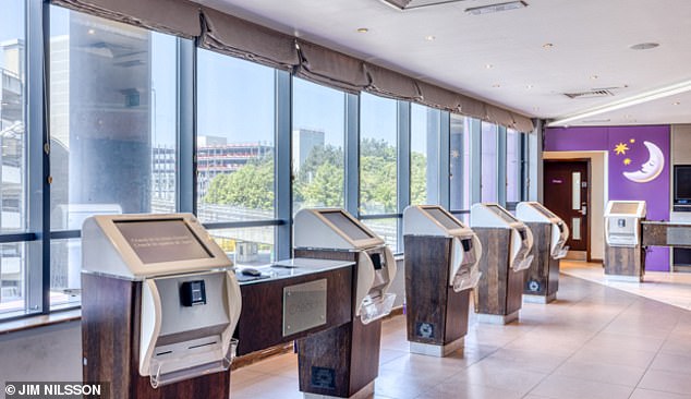 Premier Inn Gatwick North is easily accessible from Gatwick train station – just hop on the robotic shuttle train, Ted reveals. Pictured above is the hotel's self-check-in area.