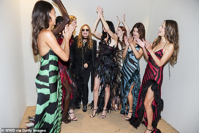 The models were seen celebrating after the show.