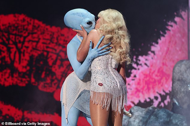 Last week at the MTV VMAs, Carpenter performed a snippet of Spears' song Oops!...I Did It Again and also kissed an alien onstage, seemingly referencing Britney and Madonna's 2003 kiss.