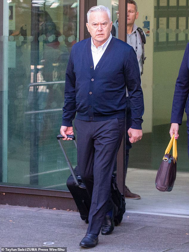 Huw Edwards leaves Westminster Magistrates' Court after receiving a six-month suspended sentence