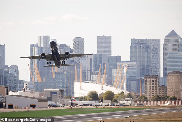 Every traveller must have their own ETA to enter the UK, including all children. (pictured: London City Airport file photo)