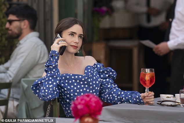 Above, Lily Collins (aka Emily) on location in the Italian capital.