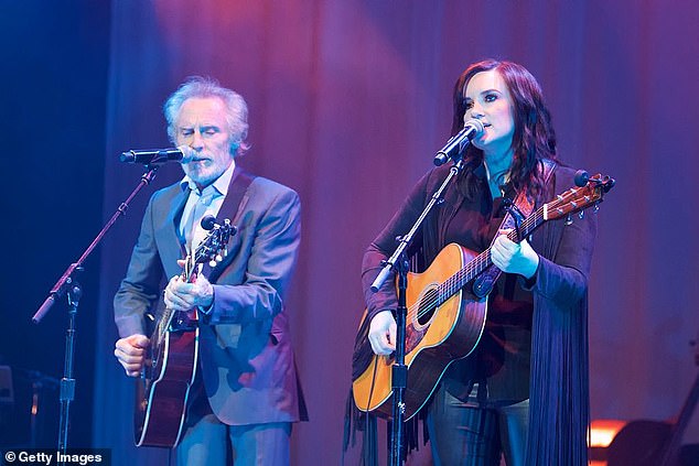 Souther pictured with singer-songwriter Brandy Clark at the Linda Ronstadt Celebration at the Ace Hotel Theatre in Los Angeles on December 11, 2016