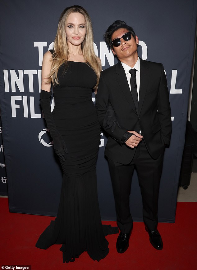 Brad's ex Angelina Jolie with Pax Jolie-Pitt attend the premiere of Without Blood during the 2024 Toronto International Film Festival