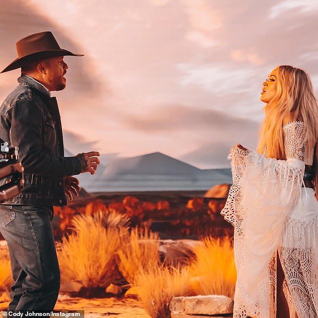 The 37-year-old Texas native took to Instagram on Wednesday to share photos from the upcoming music video for the highly-anticipated song titled I'm Gonna Love You.