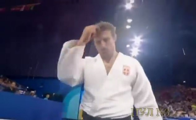 In the footage, Makhdov can be seen making the sign of the cross while competing at the Olympics.