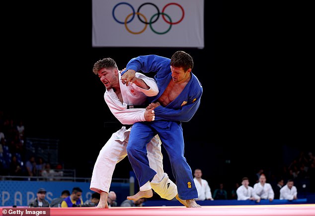 The IJF said Majdov (right) had been suspended for violating several of its policies, including making the sign of the cross while competing.