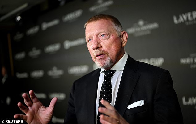 Boris opted for a smart black suit, with a white pocket square and a polka dot satin tie.