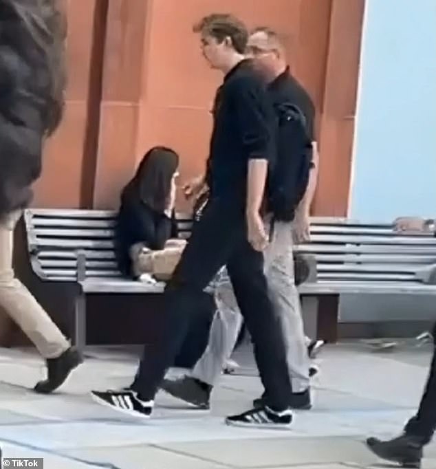 Barron walks around campus with his backpack slung over one shoulder and a low-key, casual style: polo shirt, trousers and the season's must-have sneakers, Adidas Gazelles.