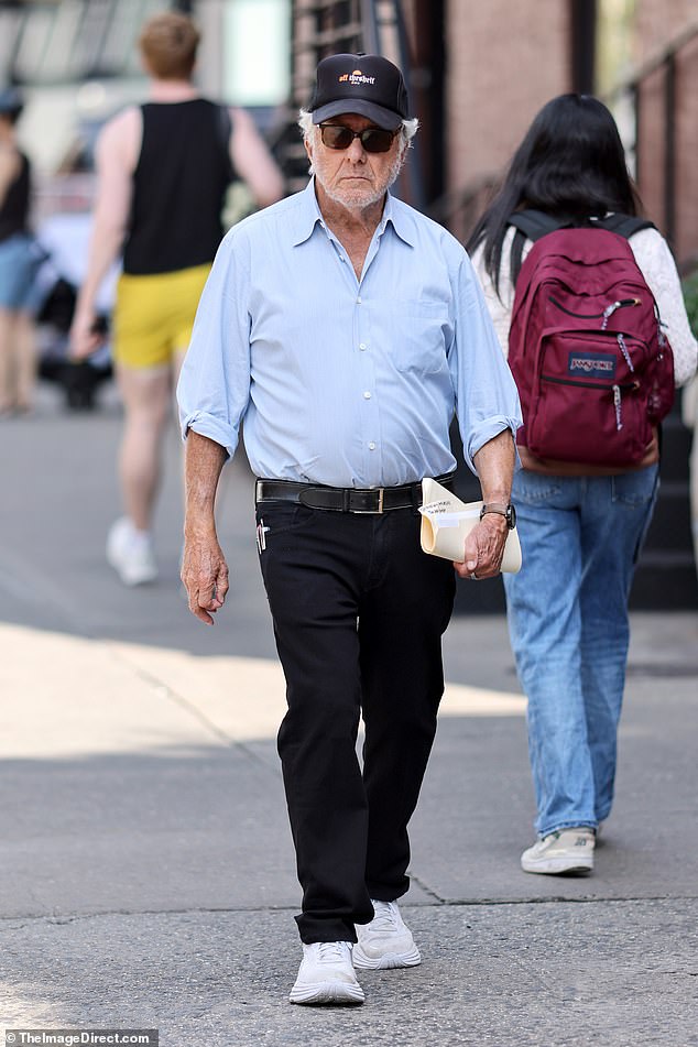 It's Dustin Hoffman! The star certainly went unnoticed, as he was seen sporting a much more disheveled look than usual, including a stubble beard.