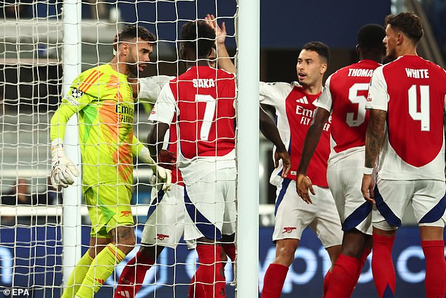 The 29-year-old was mobbed by his team-mates immediately after his stunning double save.