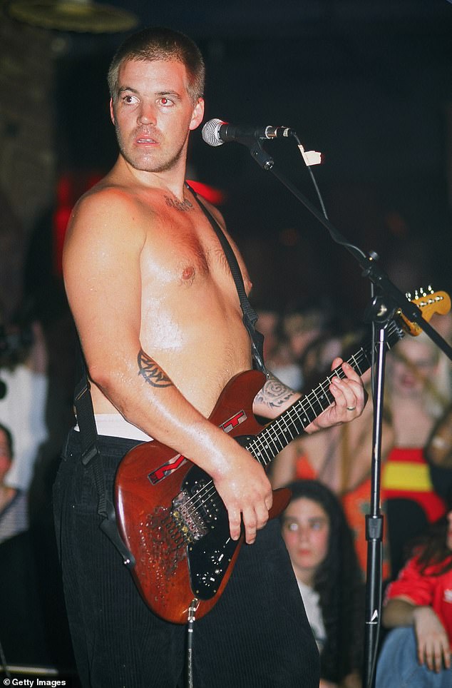 Nowell photographed on stage in New York in April 1996, about a month before he died of a heroin overdose on May 25, 1996.