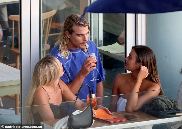 At one point he took a sip of one of the lady's Aperol Spritz.