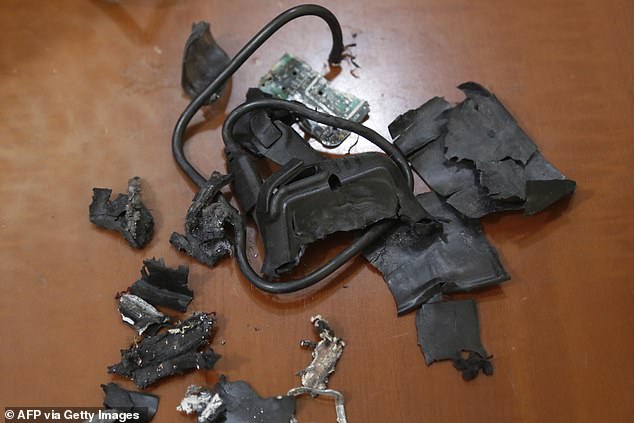 A photo taken on Sept. 18, 2024 in the southern suburbs of Beirut shows the remains of exploded pagers on display at an undisclosed location.