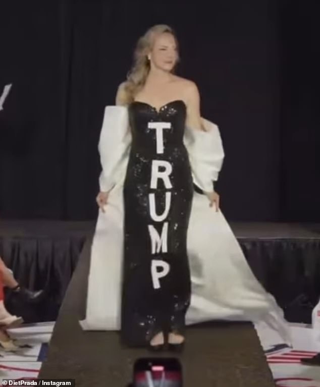 A dress with Trump's name written in diamonds (pictured) was just one of the garments on display on the catwalk.