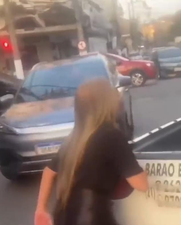 Marcelo Serra drives away in a city vehicle after his wife Gabrielle Kienen (seen above) caught him outside a hotel with another woman on Sept. 12. Two days later, Serra was fired from his job as undersecretary of the Conservation and Public Services department after the mayor of the Brazilian city of Niteroi confirmed he was using an official vehicle for personal use.