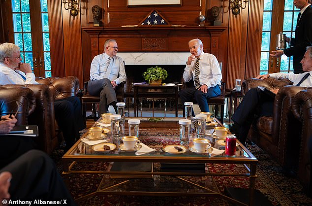 Mr Albanese was welcomed at Joe Biden's private residence (pictured with Australian Ambassador to the US Kevin Rudd, left, and US Secretary of State Antony Blinken, right)