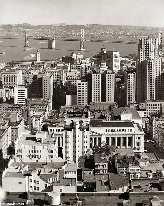 The Oakland Bay Bridge is seen connecting Oakland to downtown San Francisco.