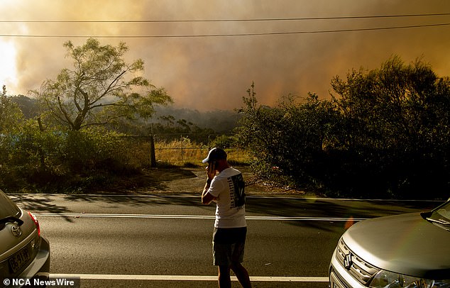 One local said he had seen large numbers of tourists arriving to watch the blaze, but had urged them to keep roads clear for firefighters.