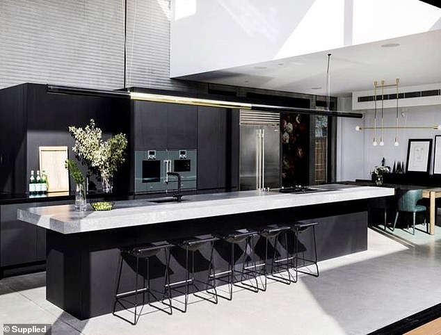 The Voice judge and his wife Jules wanted to create a sleek kitchen space, with Caesarstone countertops and Supa Black cabinets used in the space to complement the urban industrial materials used in the home.