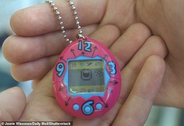 The colorful egg-shaped device housed a virtual pet whose owners had to remember to feed and play with.