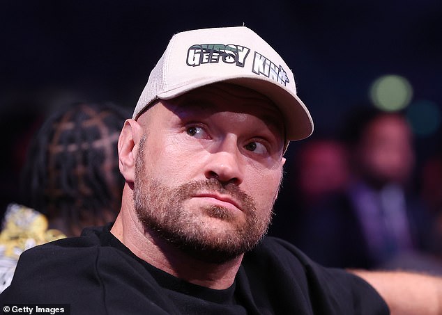 Fellow British heavyweight Tyson Fury was in attendance and watched intently.