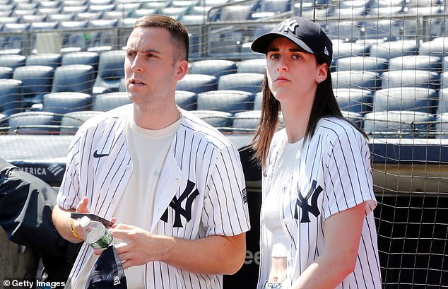 Indiana Fever's Caitlin Clark and her boyfriend Connor McCaffery attend a game between the New York Yankees and the Texas Rangers at Yankee Stadium on August 10.