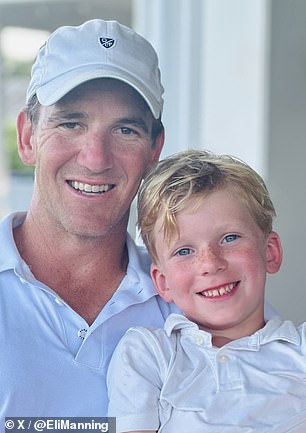 Eli Manning and his son Charlie