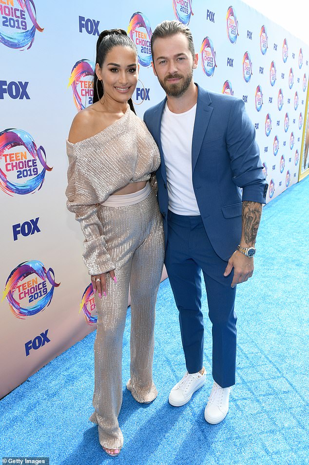 Cheryl sent her love to both Artem and Nikki (pictured in 2019), emphasizing the importance of taking time to heal, even if it requires putting their careers on hold.